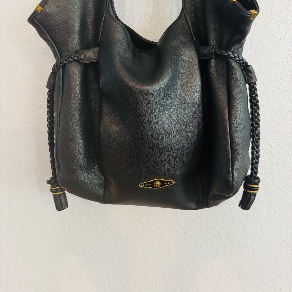 Dooney & Bourke Black Leather Shoulder Bag with Gold Accents